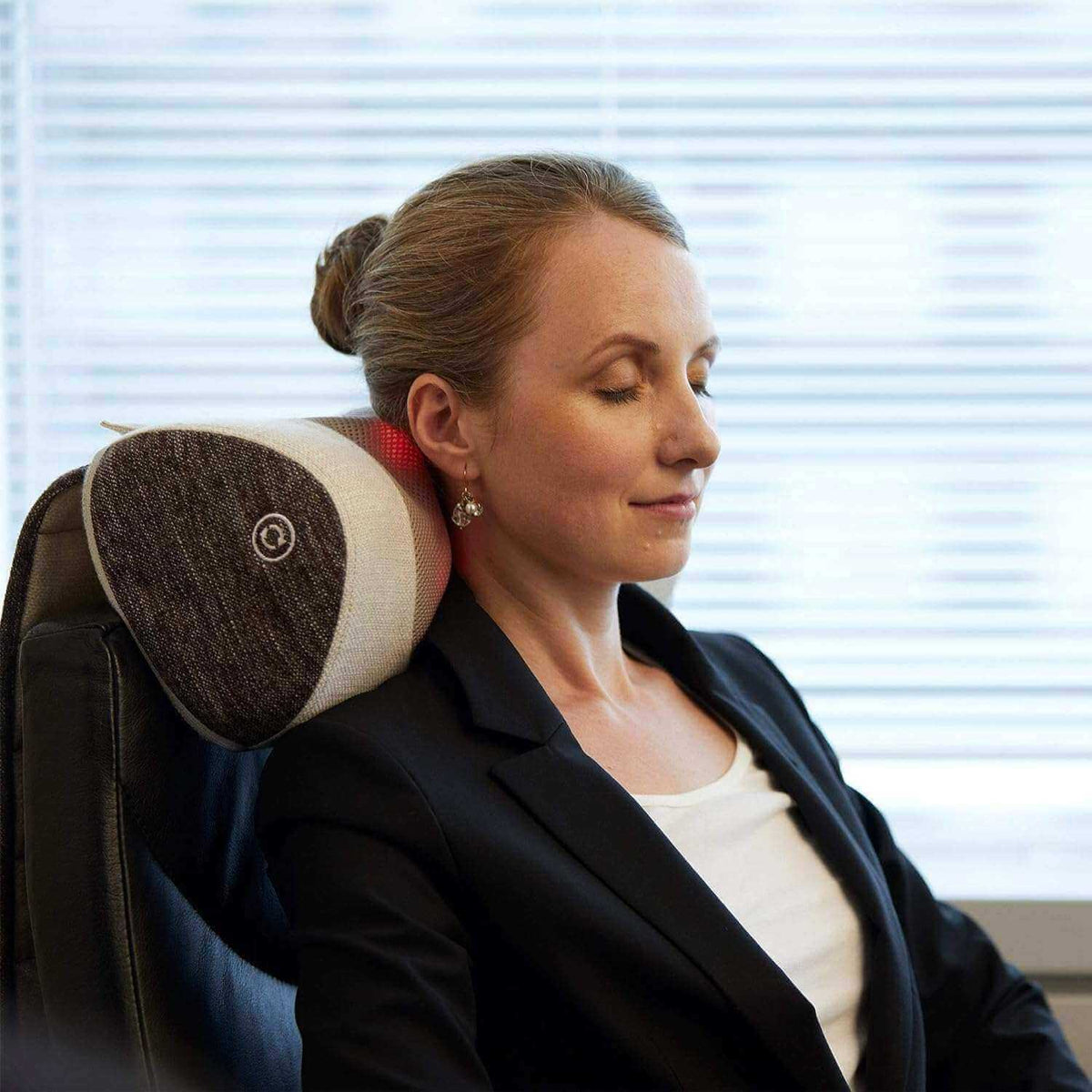 Corron Roll-Up Massage Cushion used on office chair