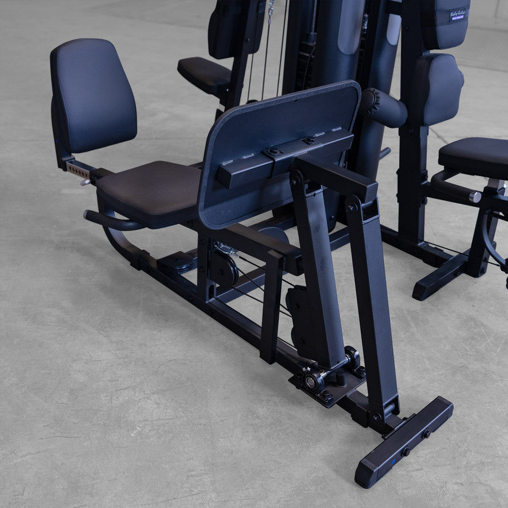 Body-Solid G9B Multi-Station Gym - close-up of leg extension and leg curl seat with adjustable back pad