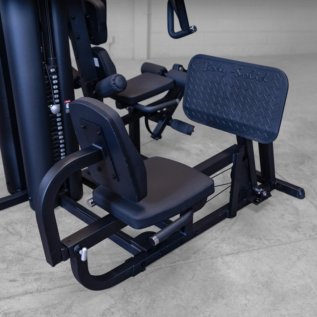 Body-Solid G9B Multi-Station Gym - close-up of leg press station with diamond-plate foot platform
