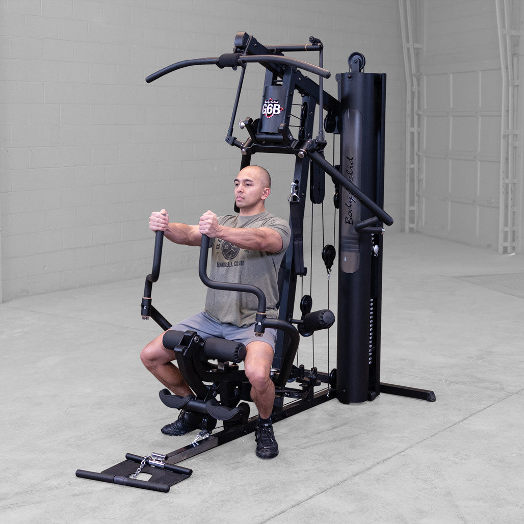 Body-Solid G6B Bi-Angular gym — Bi-Angular press station in use