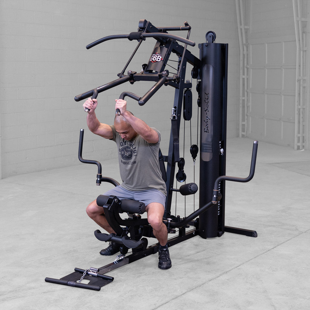 Body-Solid G6B Bi-Angular gym — shoulder press in use