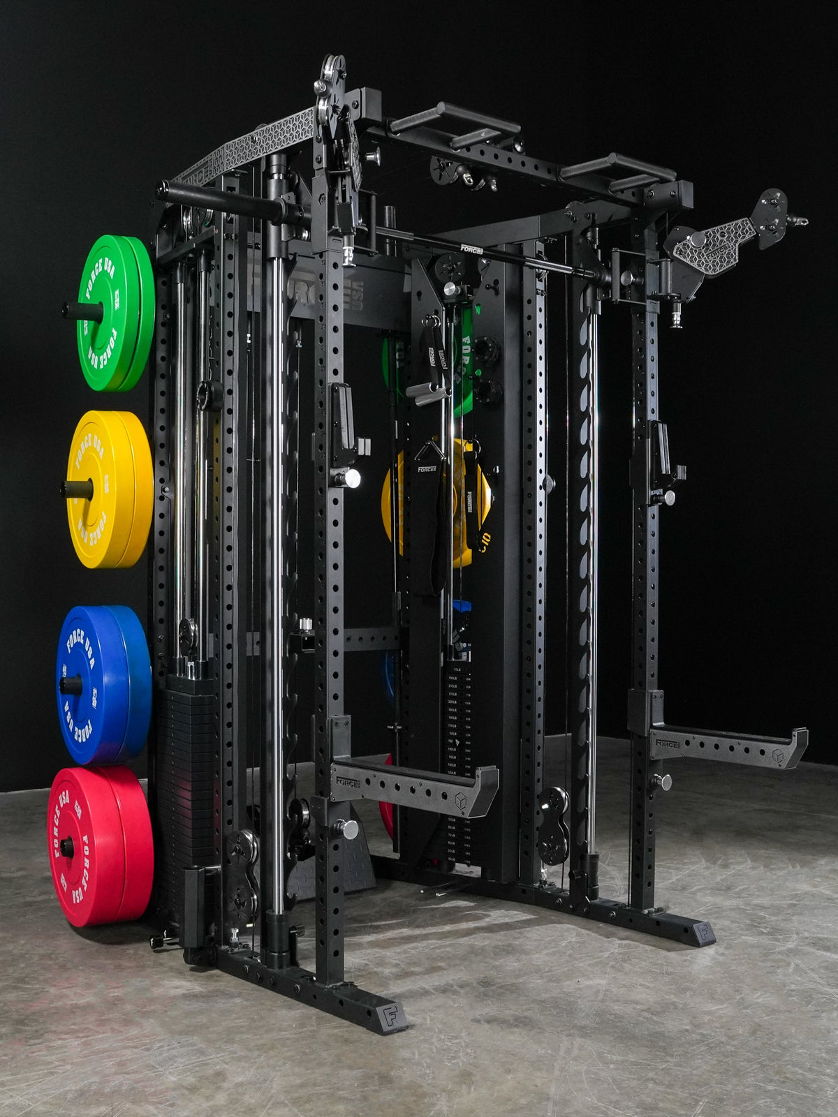 Force USA C10 All-In-One Trainer — studio front-left view with plate storage