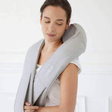 Quzy Cordless Heated Massager in use on shoulder