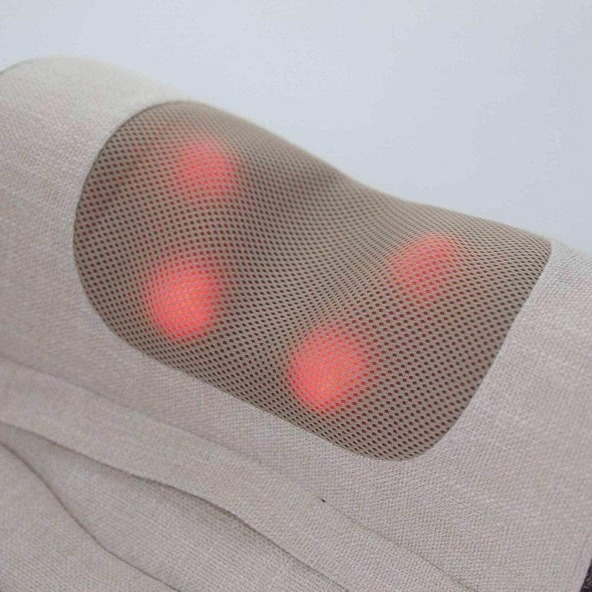 Corron Roll-Up Massage Cushion with glowing nodes close-up
