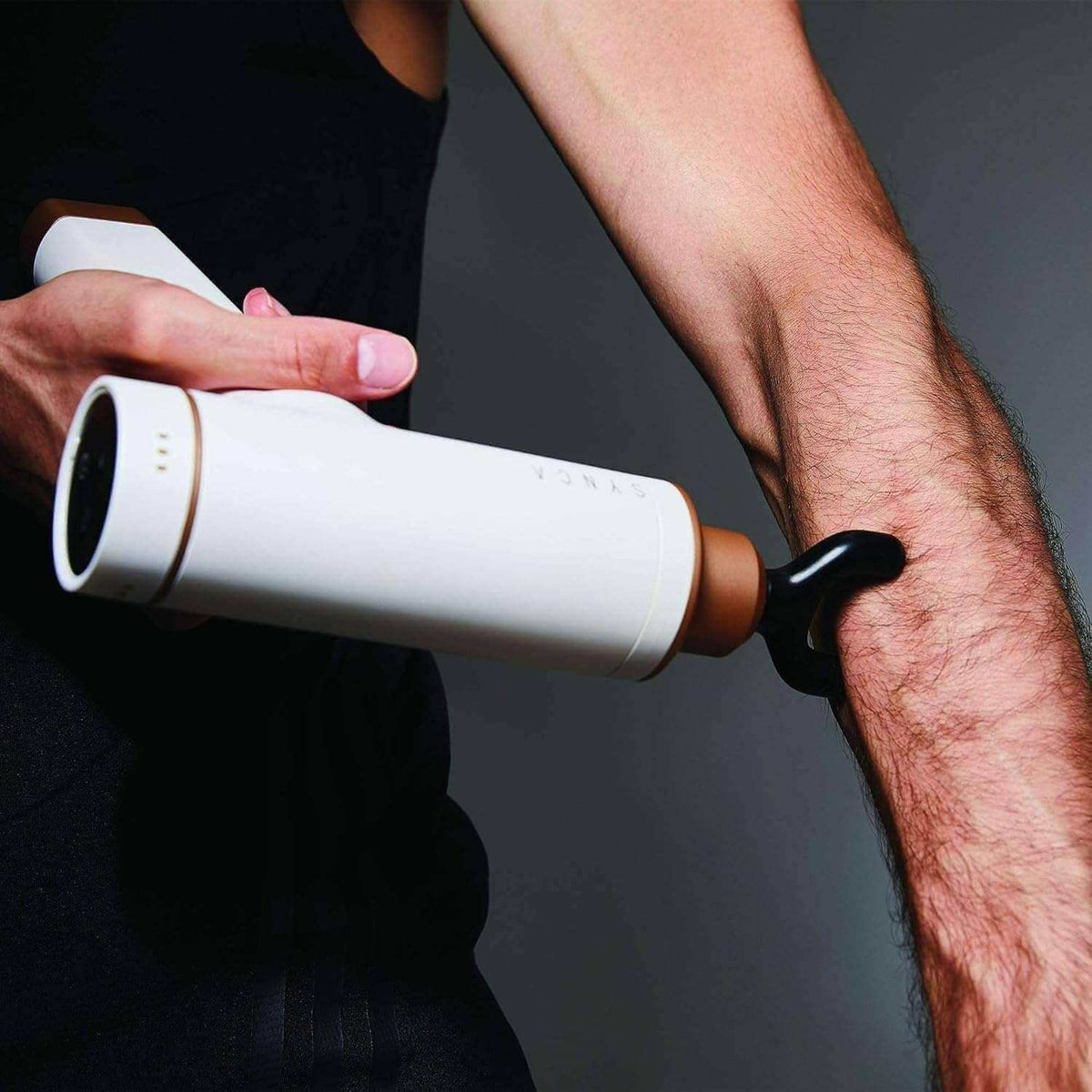 Kitta Massage Gun used on forearm muscle