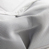 Quzy Cordless Heated Massager close-up of grey mesh fabric