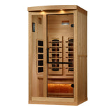 One to two person full spectrum sauna in hemlock with a glass door and lit Himalayan salt bar