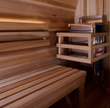 Interior bench with the electric stove and wood guard