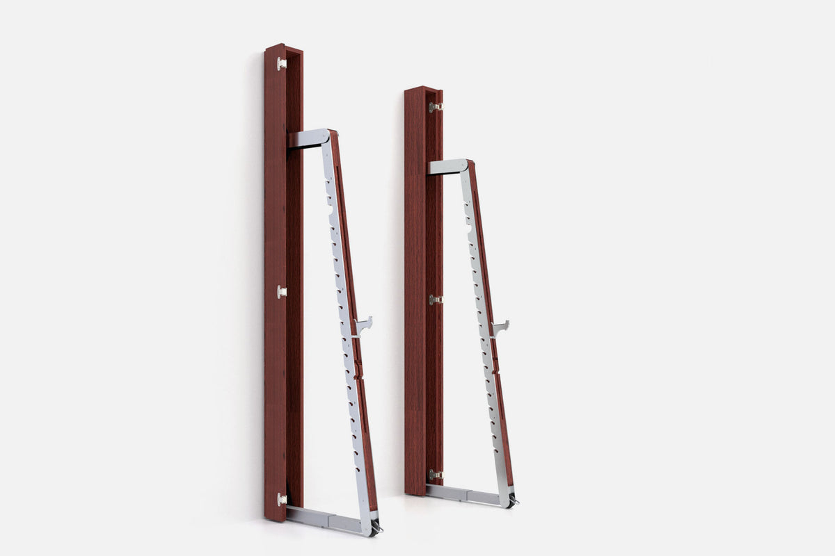 Two wall-mounted squat racks in dark reddish-brown wood, one folded shut and one opened to a silver ladder