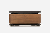 Front view of a medium-brown storage bench with the padded lid raised and resistance bands visible inside